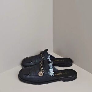 Authentic CHANEL Black Quilted Mules with Gold Chain